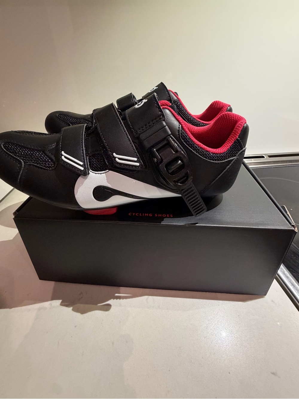 Woman’s Peltons Cycling Shoes with White Swoosh and Red Lining - New in box.